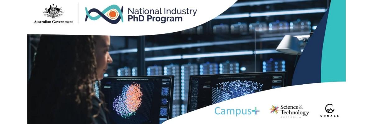 Banner for the national industry PhD program. Program logos sit in the top left-hand corner, program partners in the bottom right-hand corner, and an image of a women looking at computer screens takes up the remaining image.