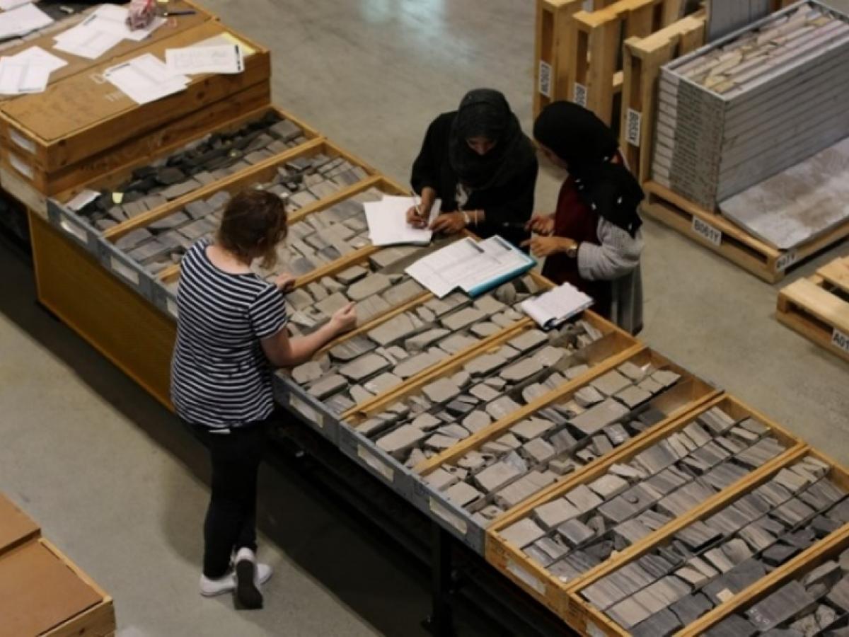 Women working at the drill core library