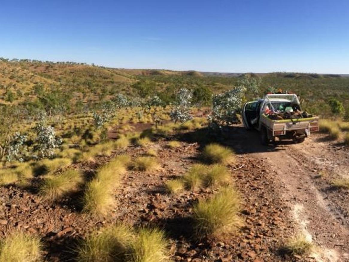 Car driving along dirt road in the Proterozoic Birrindudu Basin