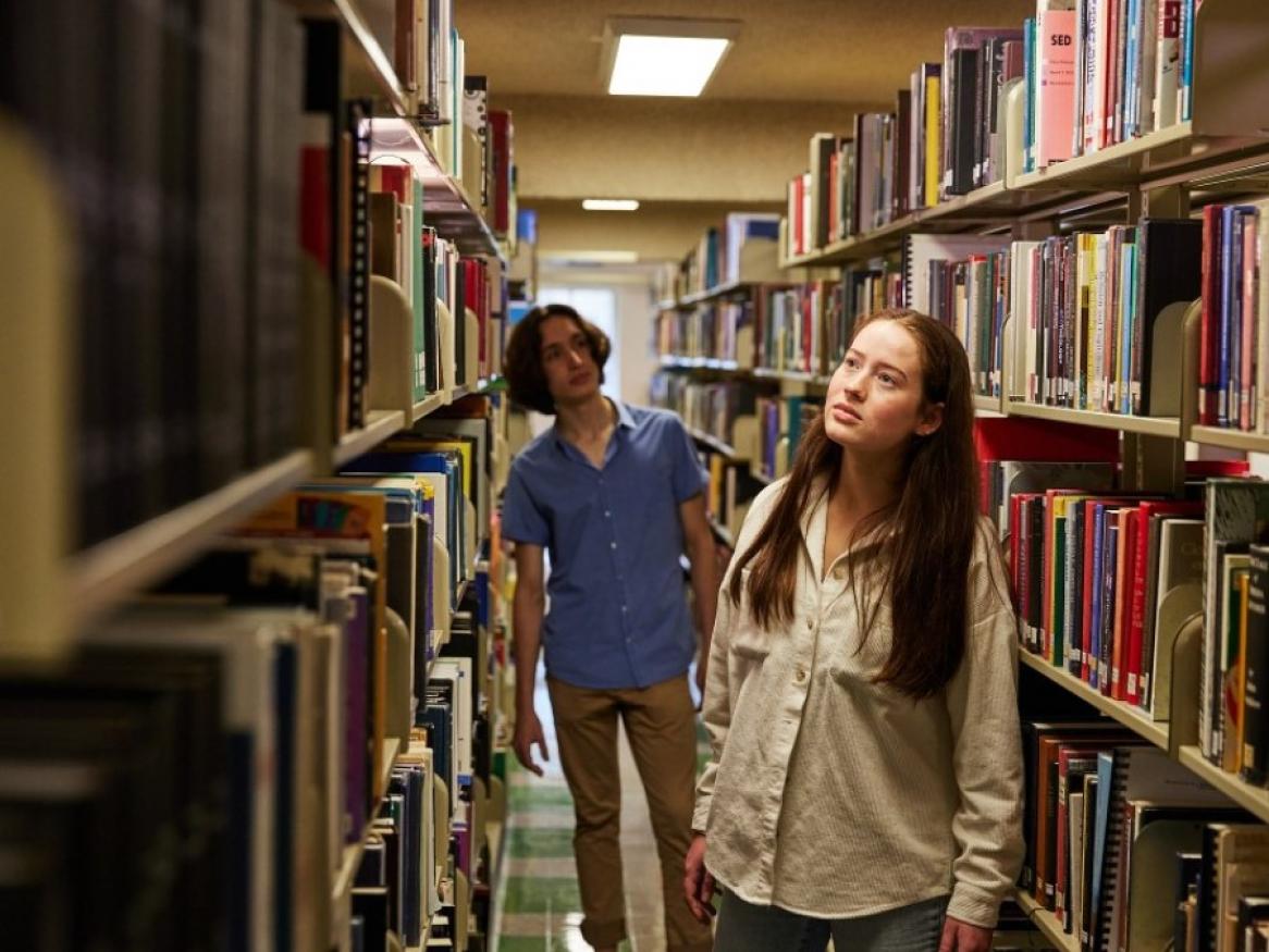 Students browsing the shelves of the Barr Smith Library