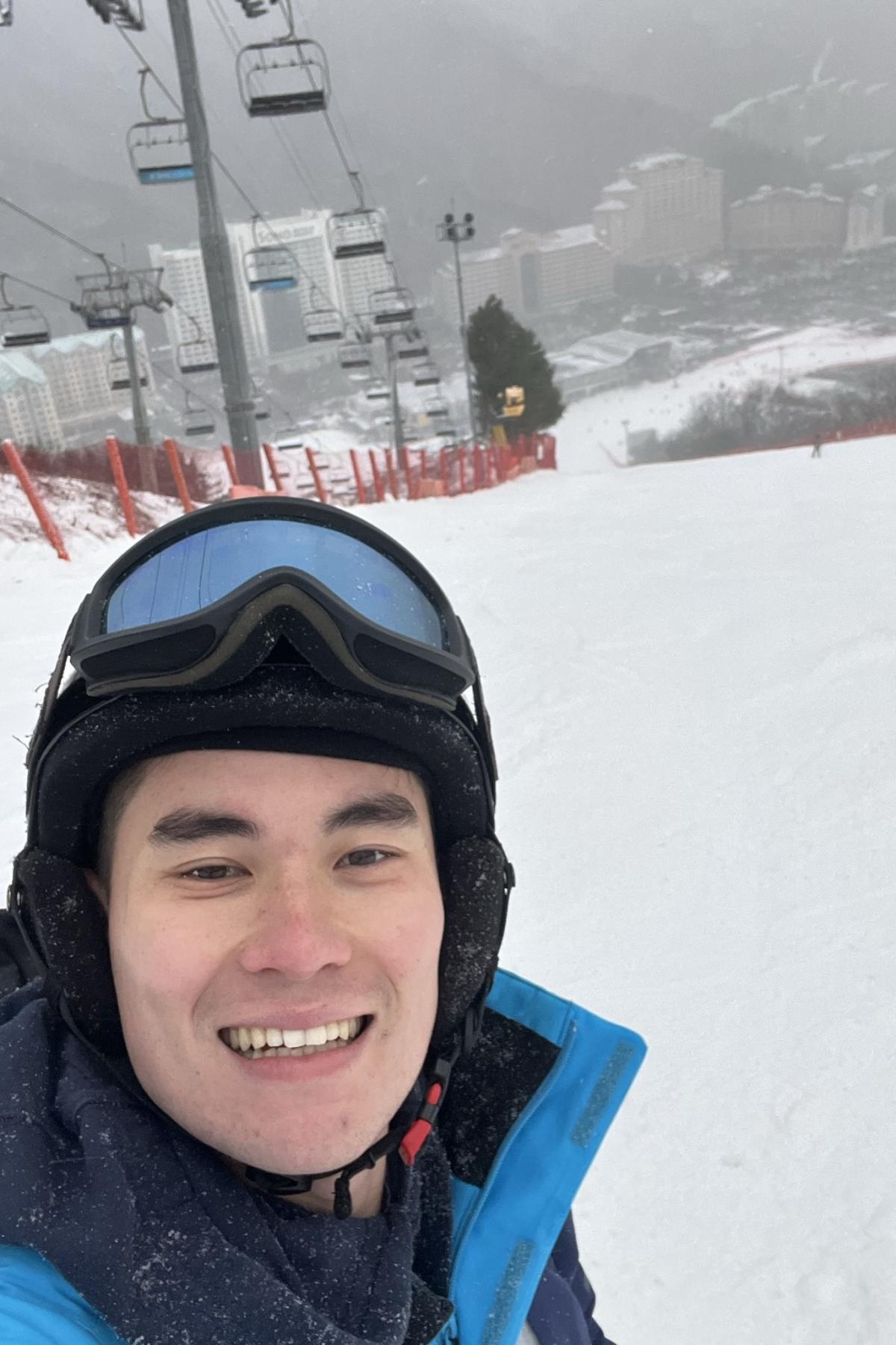 Rhys taking a selfie while skiing