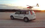 The Unmanned Aerial Vehicle is launched from the roof of a moving car