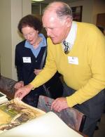 Judith (left) and Revett Cant examine some of the rare items in the Librarys Special Collections