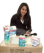 Asha Patel with some of the supplies she will be taking over to Sri Lanka
Photo by Howard Salkow