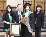 Music teacher Esther Yu (2nd from right), pictured with family, graduated with a Bachelor of Music Education (Honours).
Photo by David Ellis