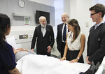 Emeritus Professor Robin Warren AC pictured with University of Adelaide Vice-Chancellor and President Professor McWha AO and medical students. 
Photo by Kendall Marriott