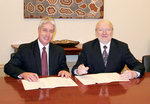 From left: DEFEST Chief Executive Mr Brian Cunningham and Professor McWha