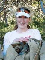 Left: Leah Kemp pictured with a Tammar Wallaby at Innes National Park