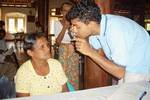 Medical student Isuru Amarasena (University of Tasmania) examines a woman at an ophthalmology clinic in a rural village just north of Galle, Sri Lanka. This was part of a group visit to Sri Lanka by medical students from different universities, including the University of Adelaide, organised by the Australian Medical Students Association.
Photo by Marion Davis, courtesy of Asha Patel