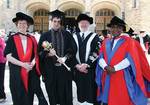 Mace-bearer Gary Shrubsole (second from left) pictured with the Head of the School of Architecture, Landscape Architecture & Urban Design, Professor Nancy Pollock-Ellwand, the Vice-Chancellor and President, Professor James McWha, and the Director of the Centre for Australian Indigenous Research and Studies, Professor Roger Thomas
Photo by Candy Gibson