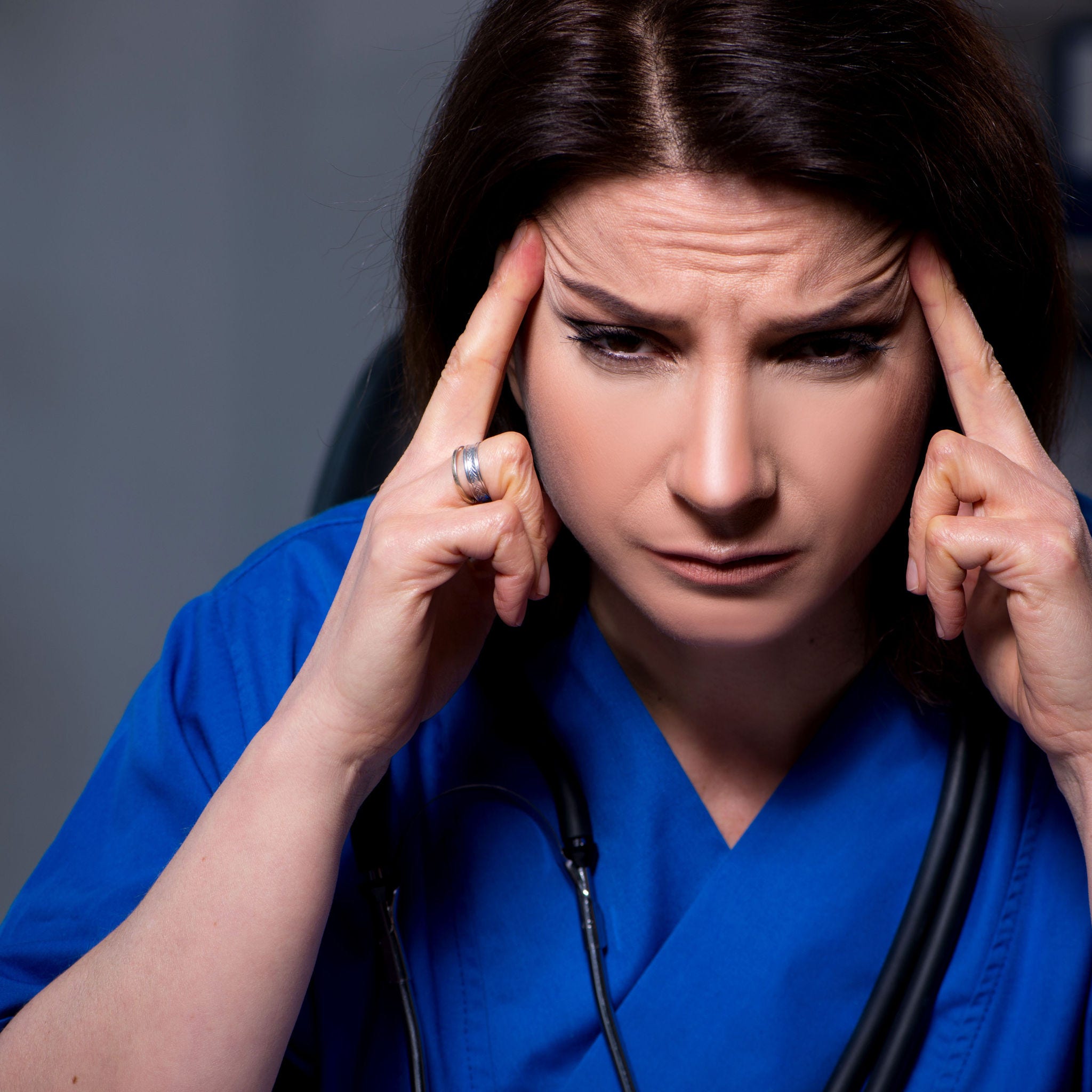 stressed woman on night shift at hospital
