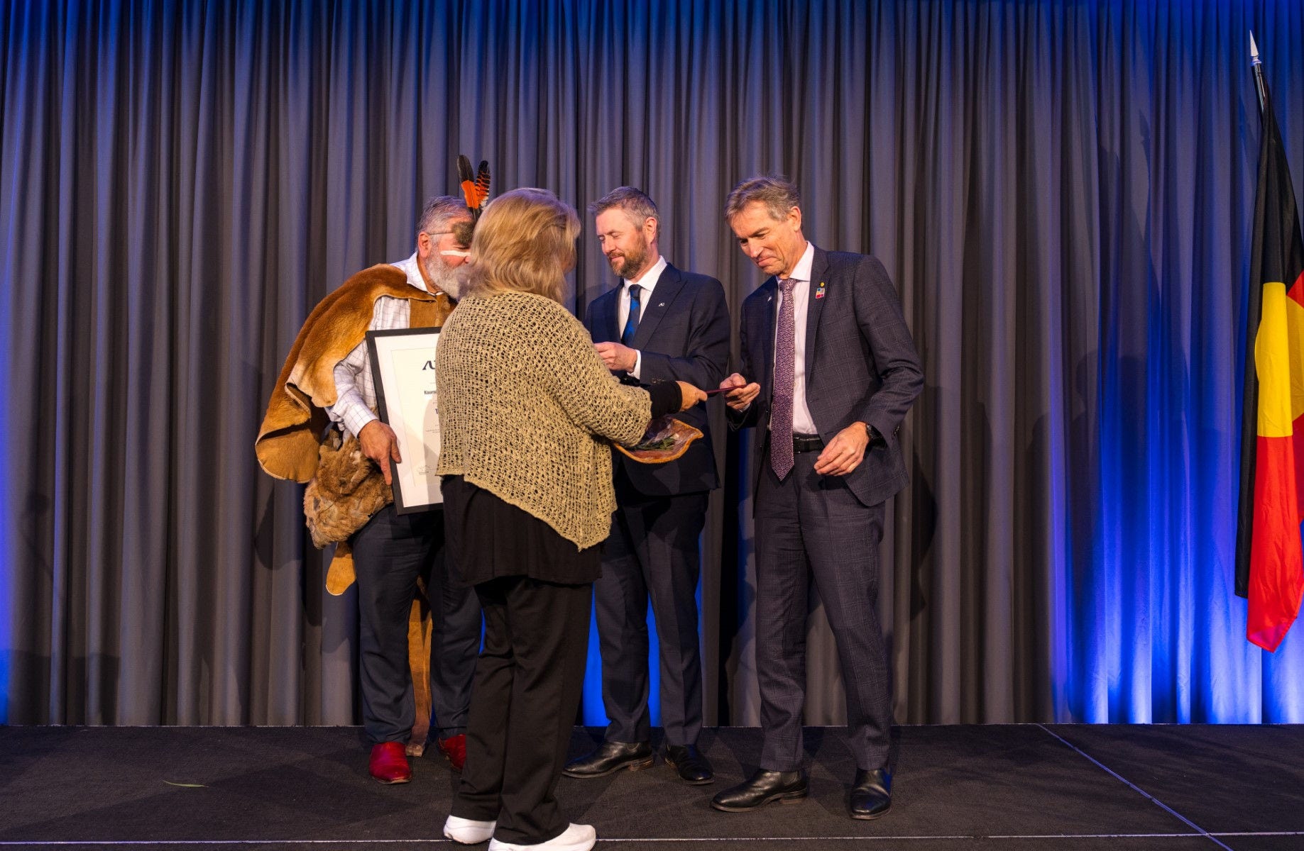 Uncle Mickey O'Brien and Alison Denee, co-Chairs of Kaurna Warra Karrpanthi, Professor Peter Hoj AC and Professor David Lloyd, Co-Vice Chancellors Adelaide University.
