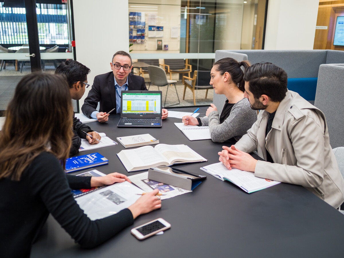 A group of marketing scientists in a meeting