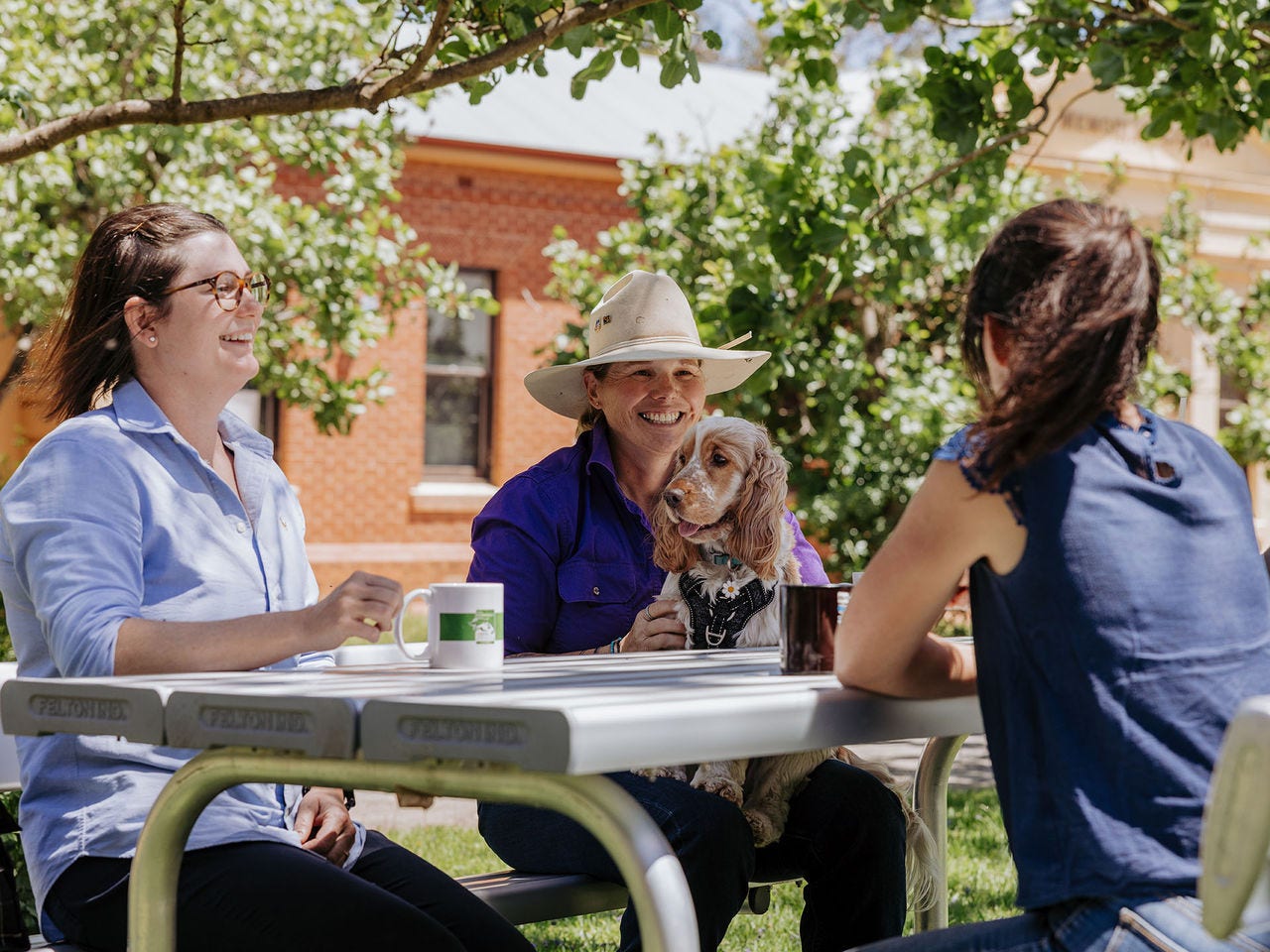 Mandi Carr having a coffee with colleagues