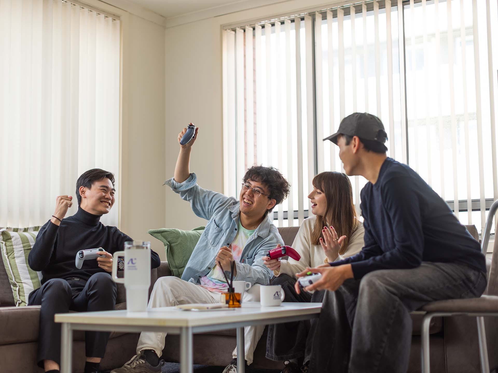 Residents using their living room space at Adelaide University Village student accommodation