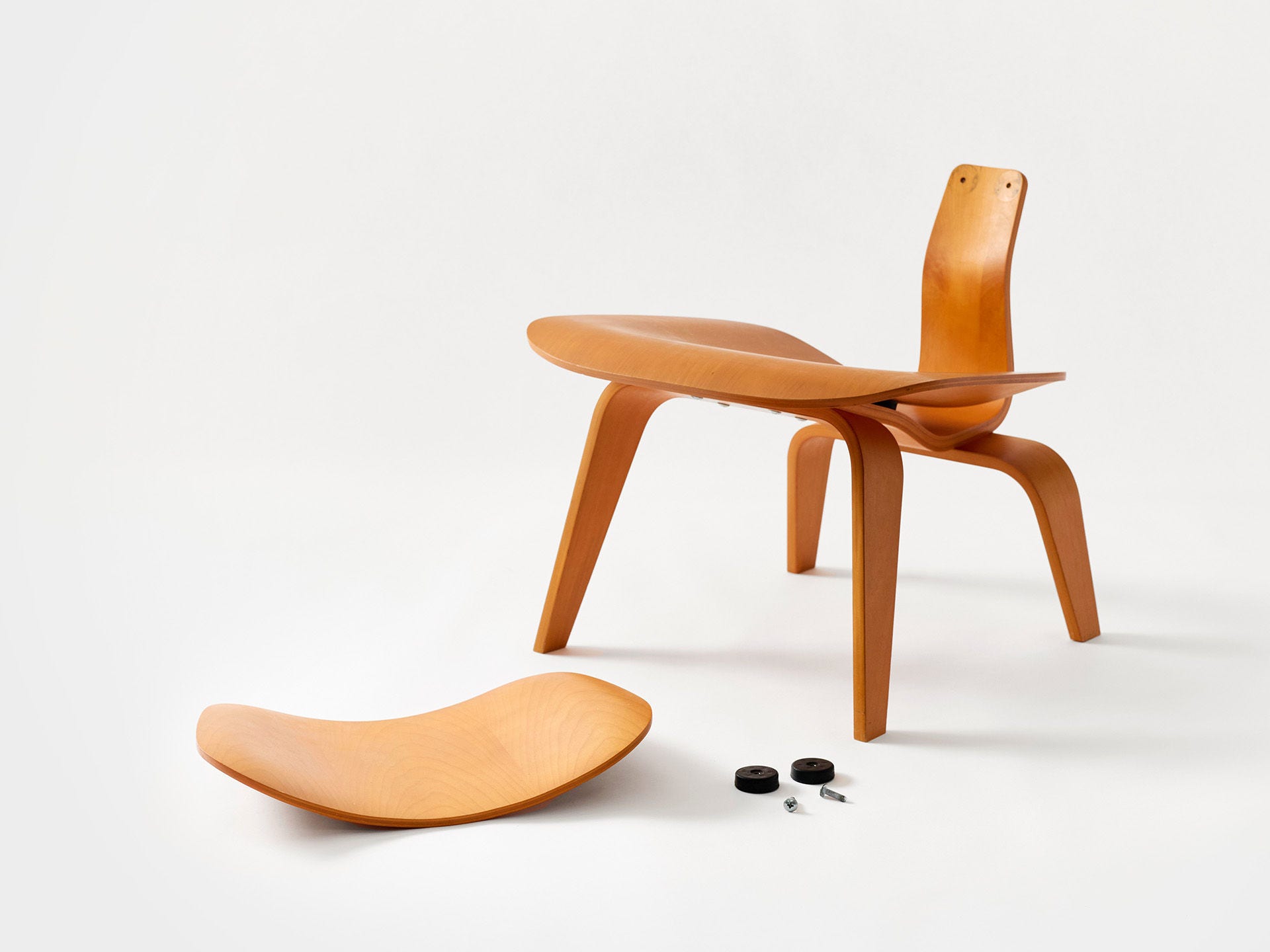 Transformative repair - Broken Eames Chair. Photo by Jeremy Park