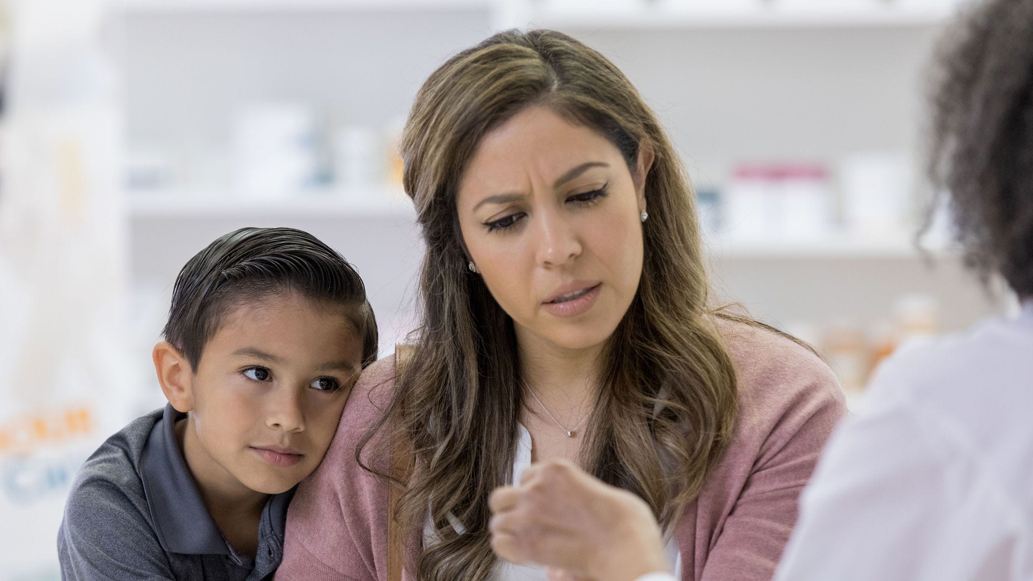 mother with child asking about medicines