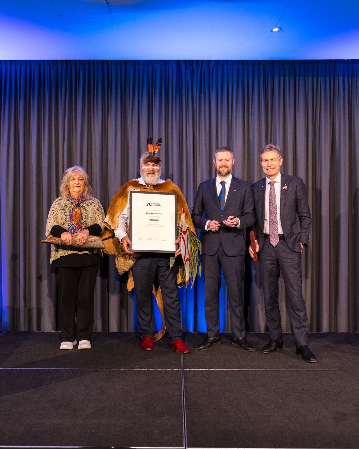 Alison Denee and Uncle Mickey O'Brien, co-Chairs of Kaurna Warra Karrpanthi, Professor David Lloyd and Professor Peter Hoj AC, Co-Vice Chancellors Adelaide University.