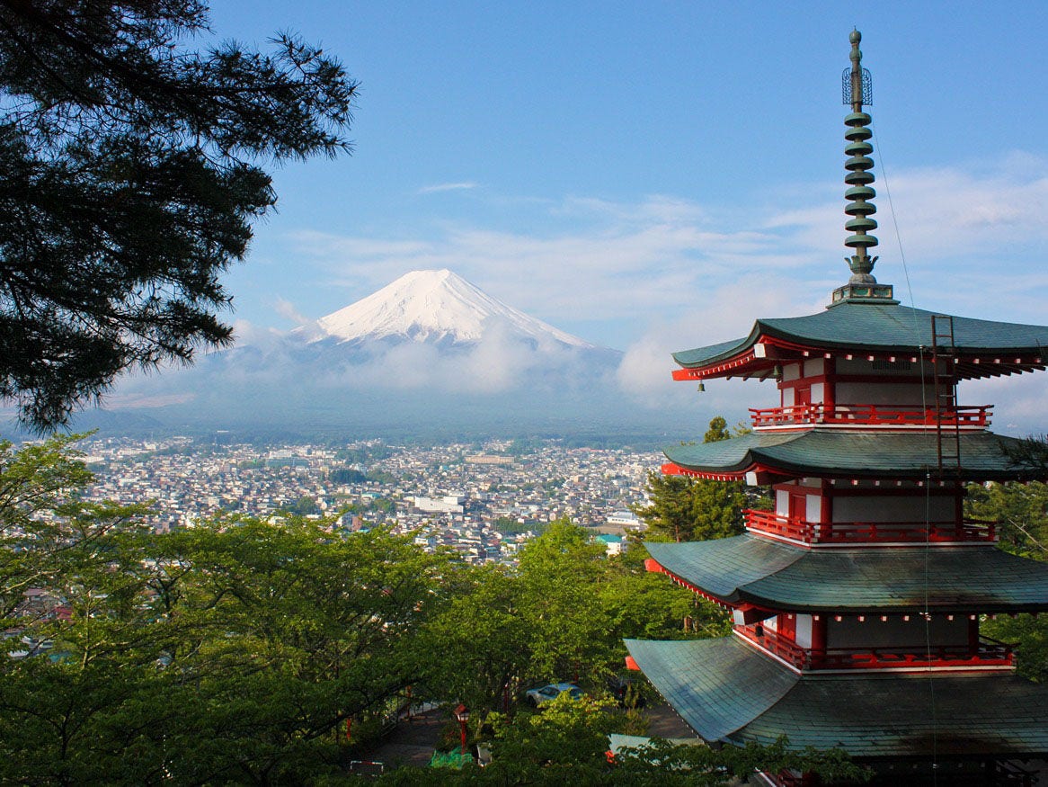 A panoramic scene of the city and Mount Fuji, Japan