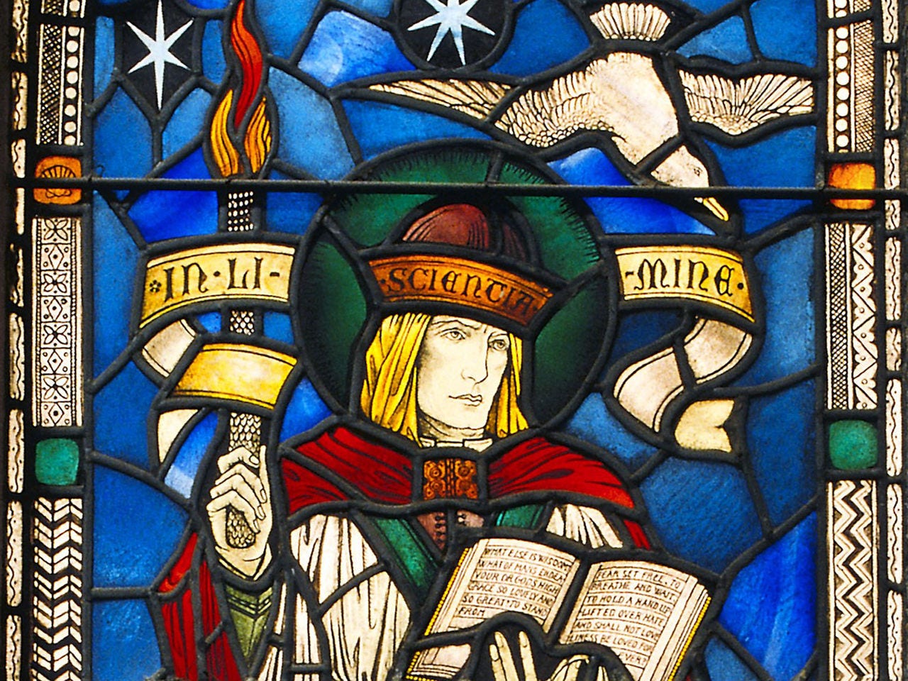 Image of the Edith Lungly Window showing a beautiful stained glass window of a man and a bird using blue, yellow, green, red and sandstone colours.