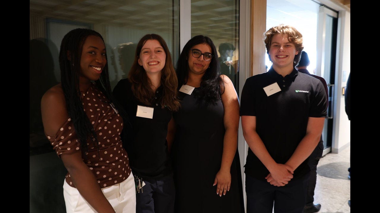 four engineering students standing in a group