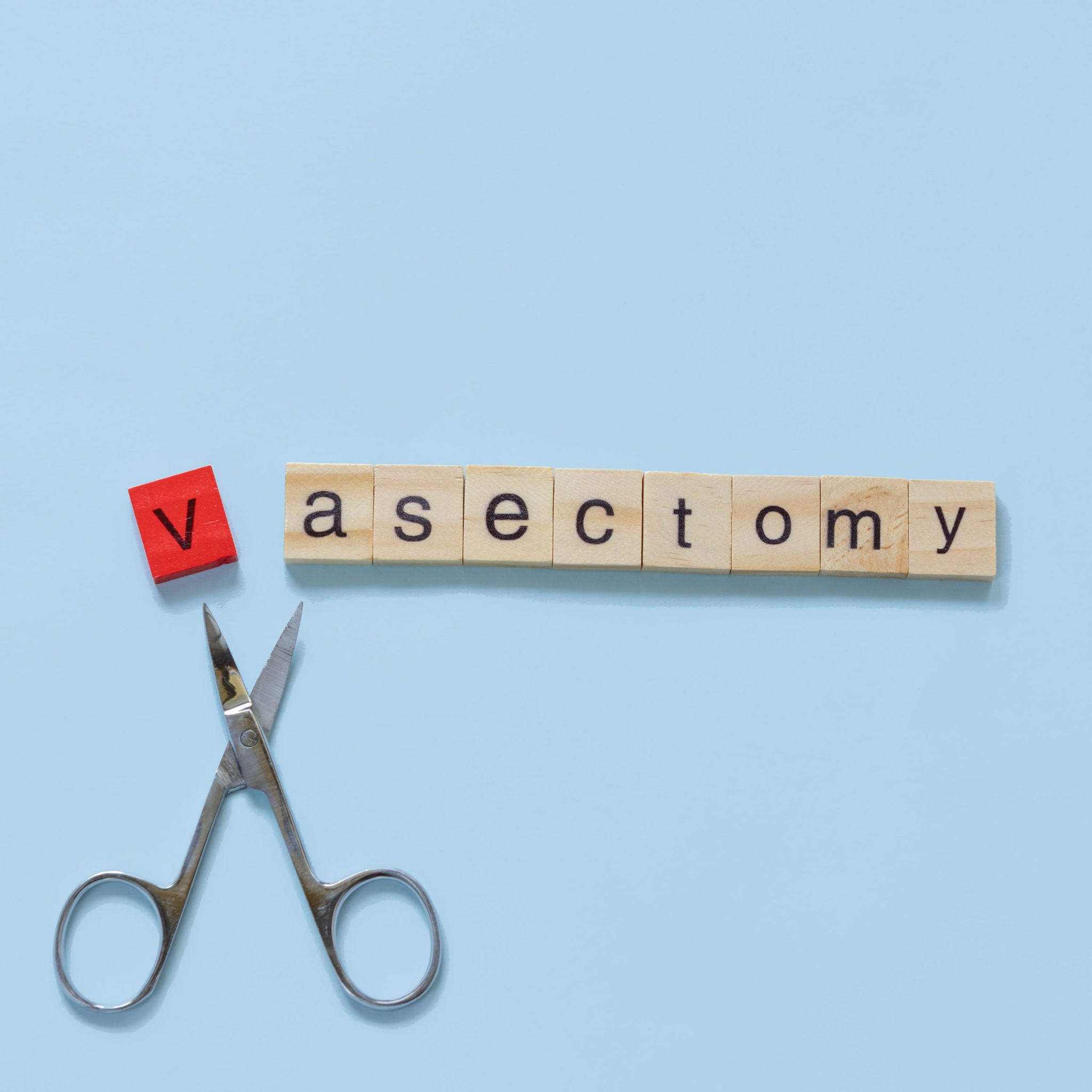 scissors cutting the word 'vasectomy'