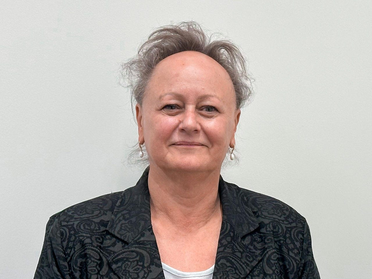Professor Esther May
