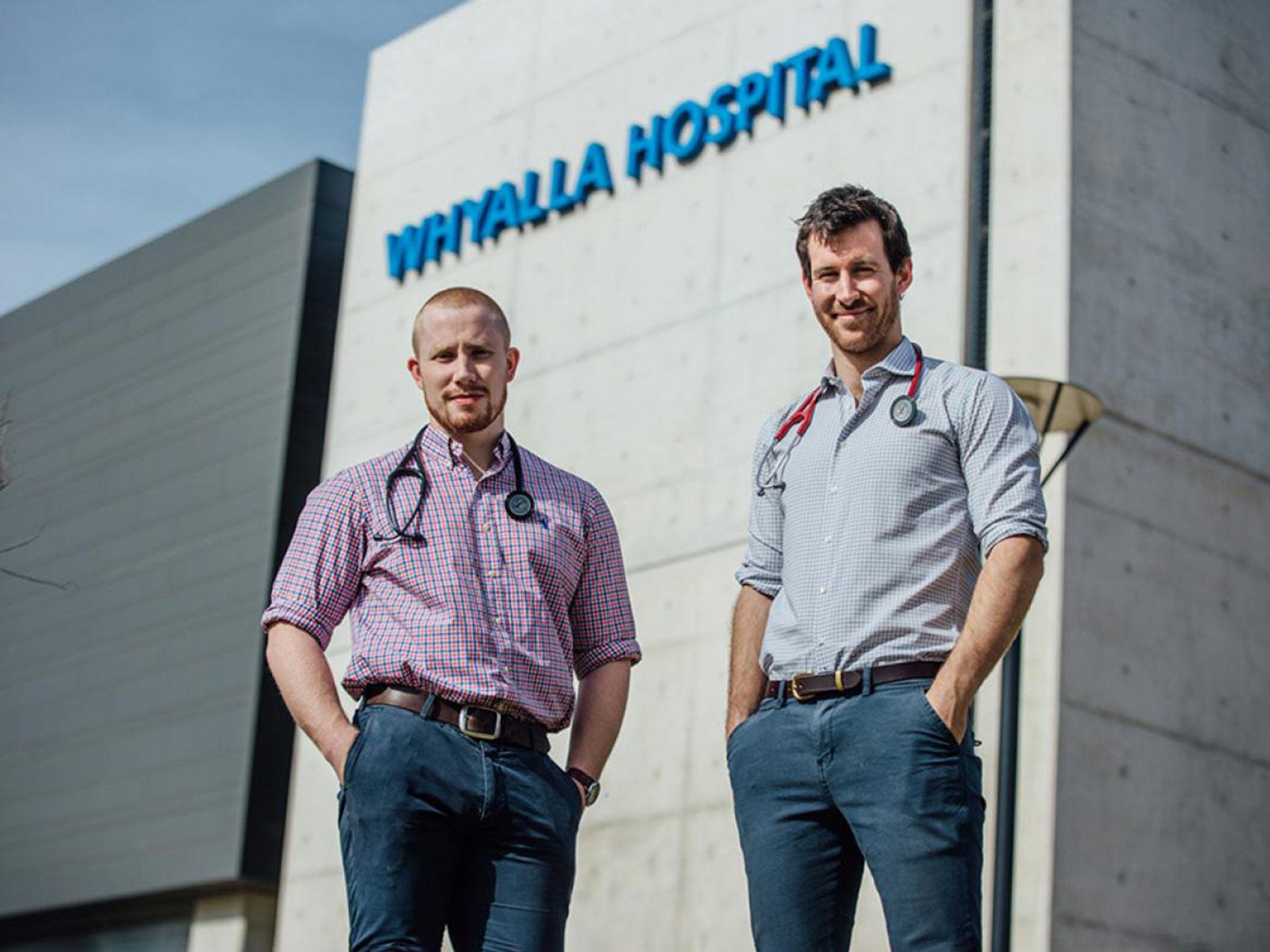 Two medical staff standing outside the Whyalla hospital