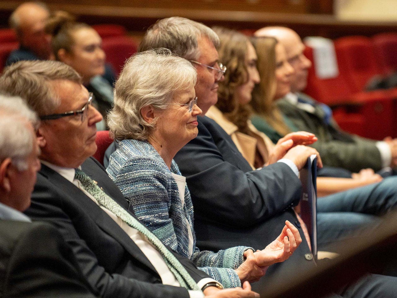 A side view of the audience