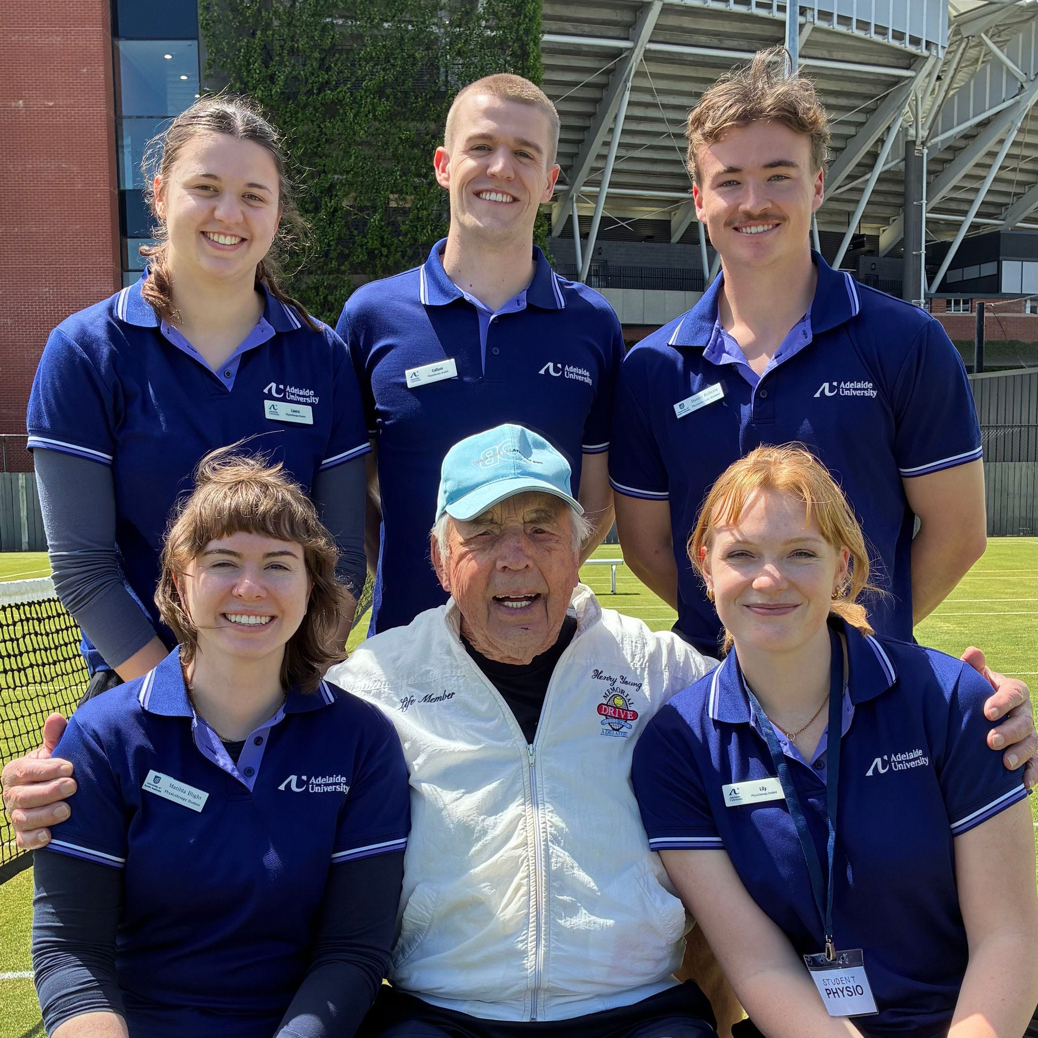 Tennis player Henry Young with Adelaide University physio students
