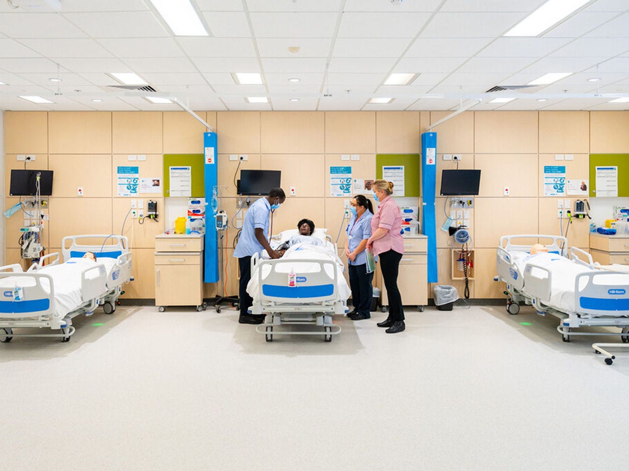Nursing students working in a hospital ward