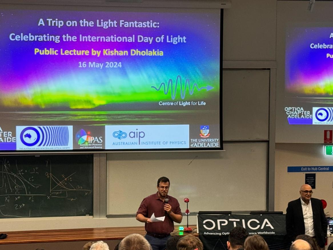Kishan giving presentation A Trip on the Light Fantastic