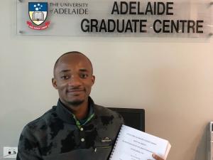 Thomas Agbaedeng submitting Thesis May 2019