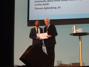 Thomas Agbaedeng winning Ralph Reader Award at CSANZ