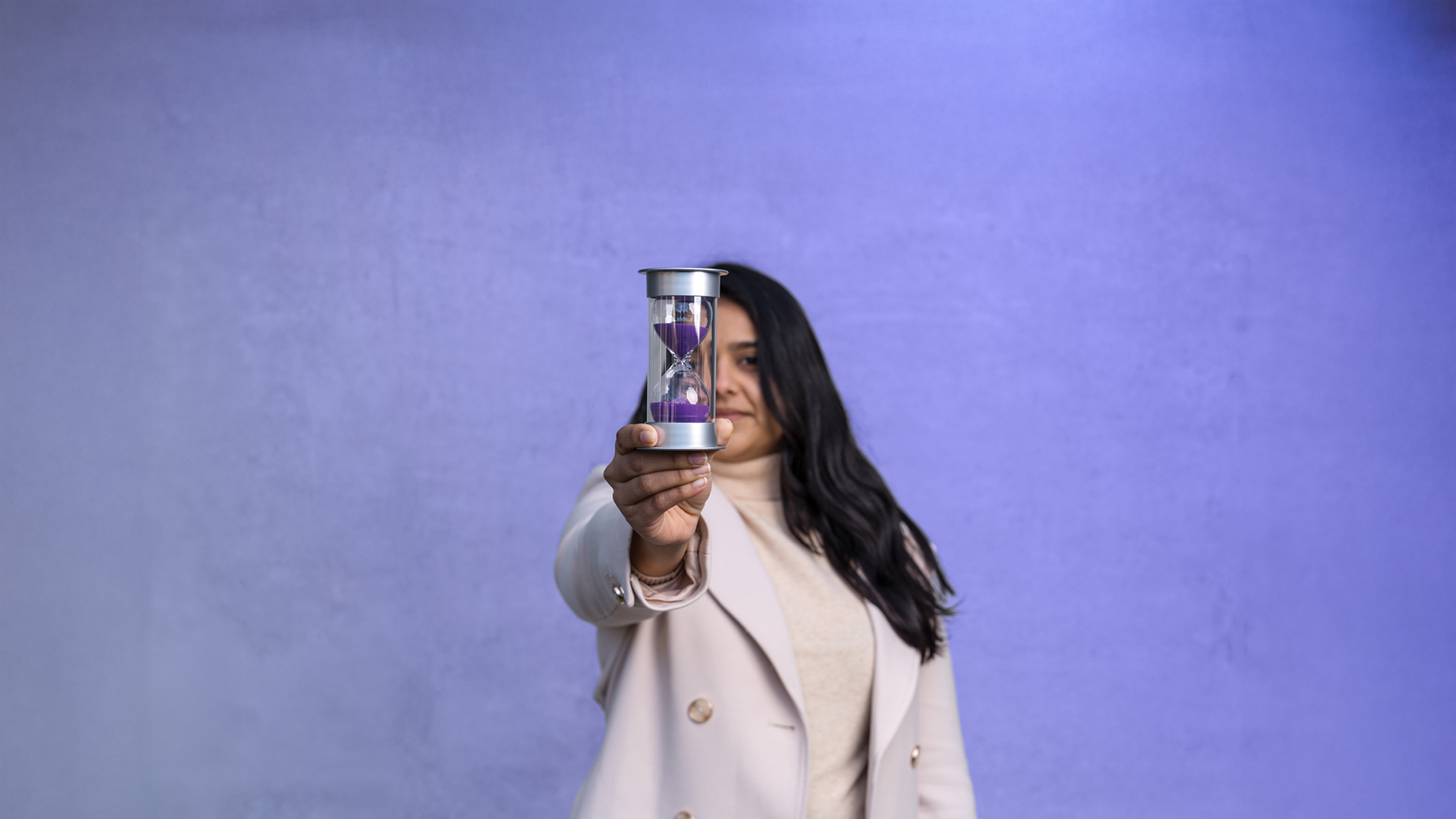Woman holding a timer