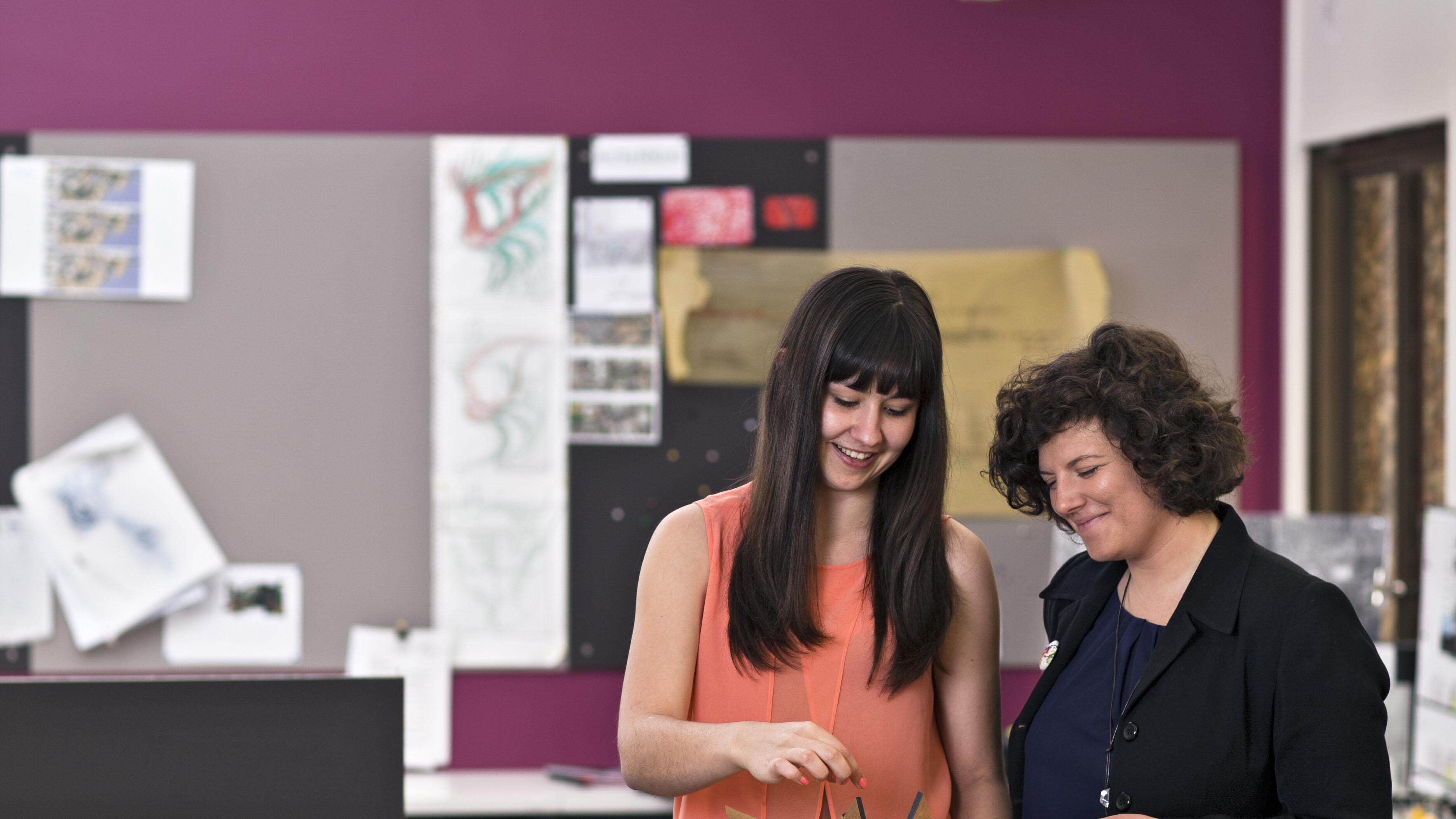 Design students with their work