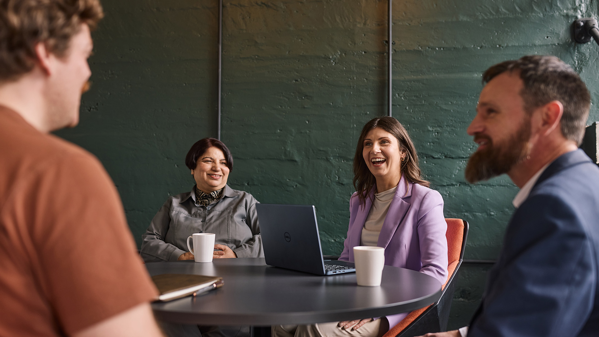 University staff and partners in a meeting