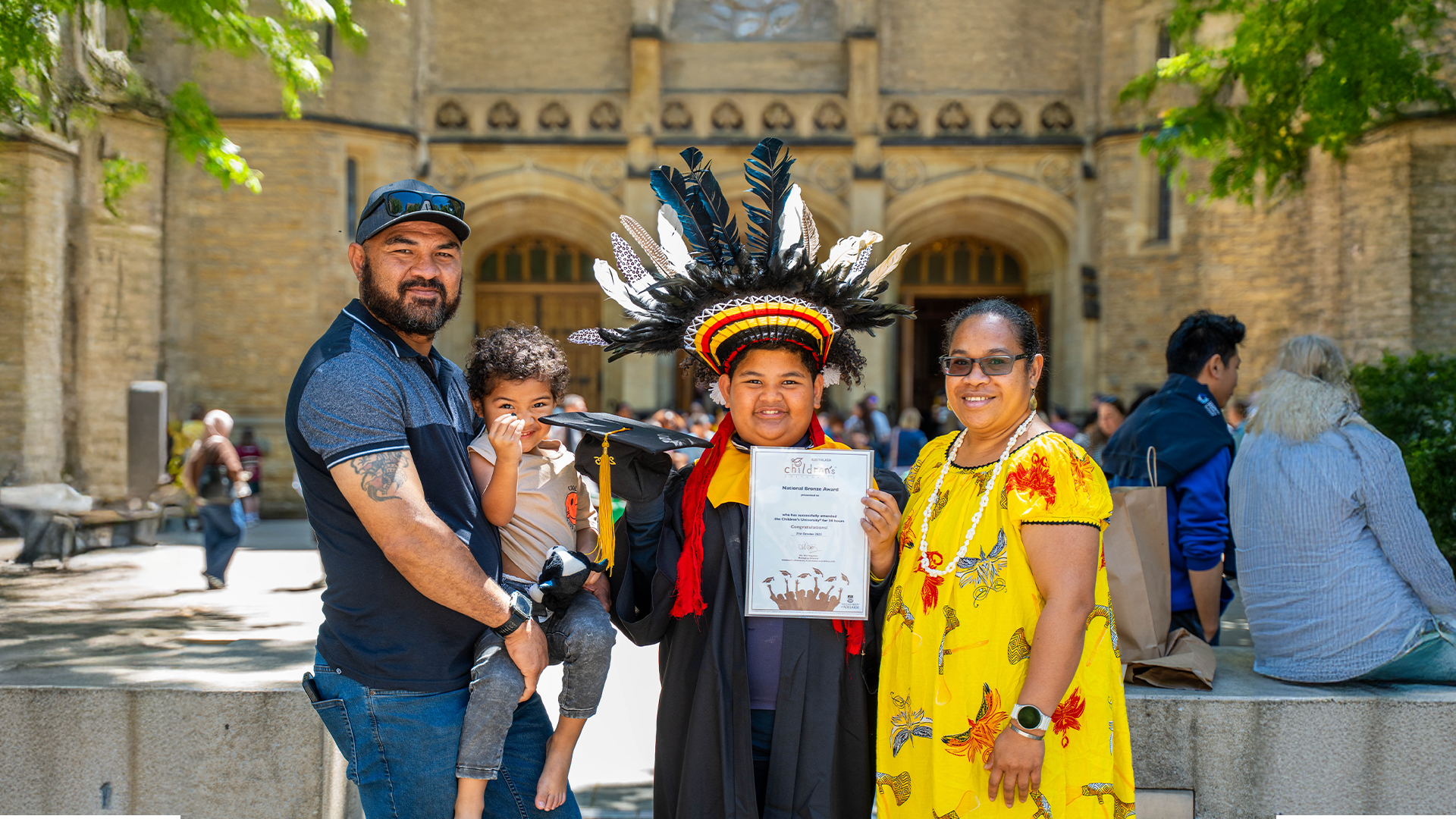 Child's graduation with family