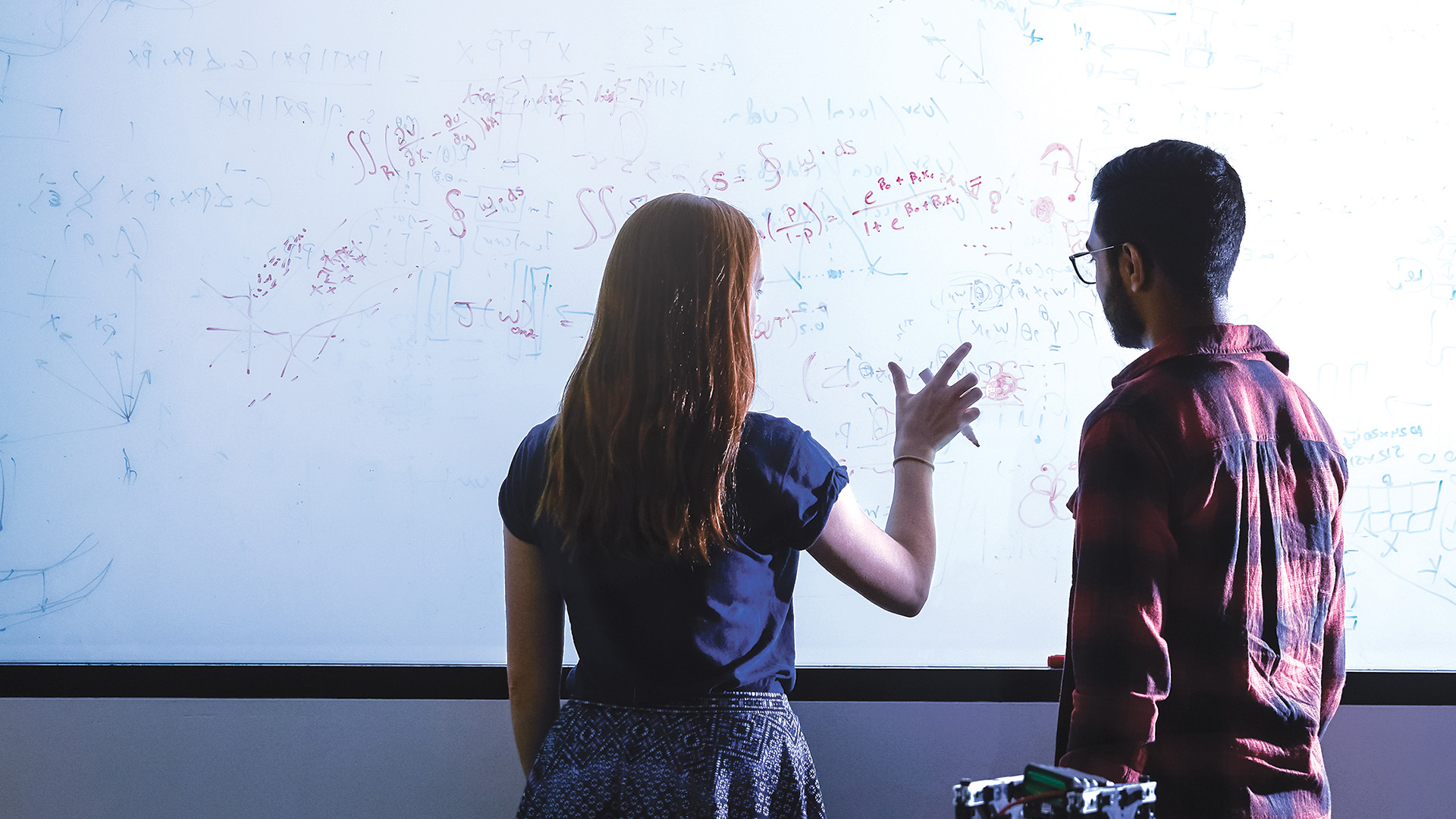 Researchers in a data lab