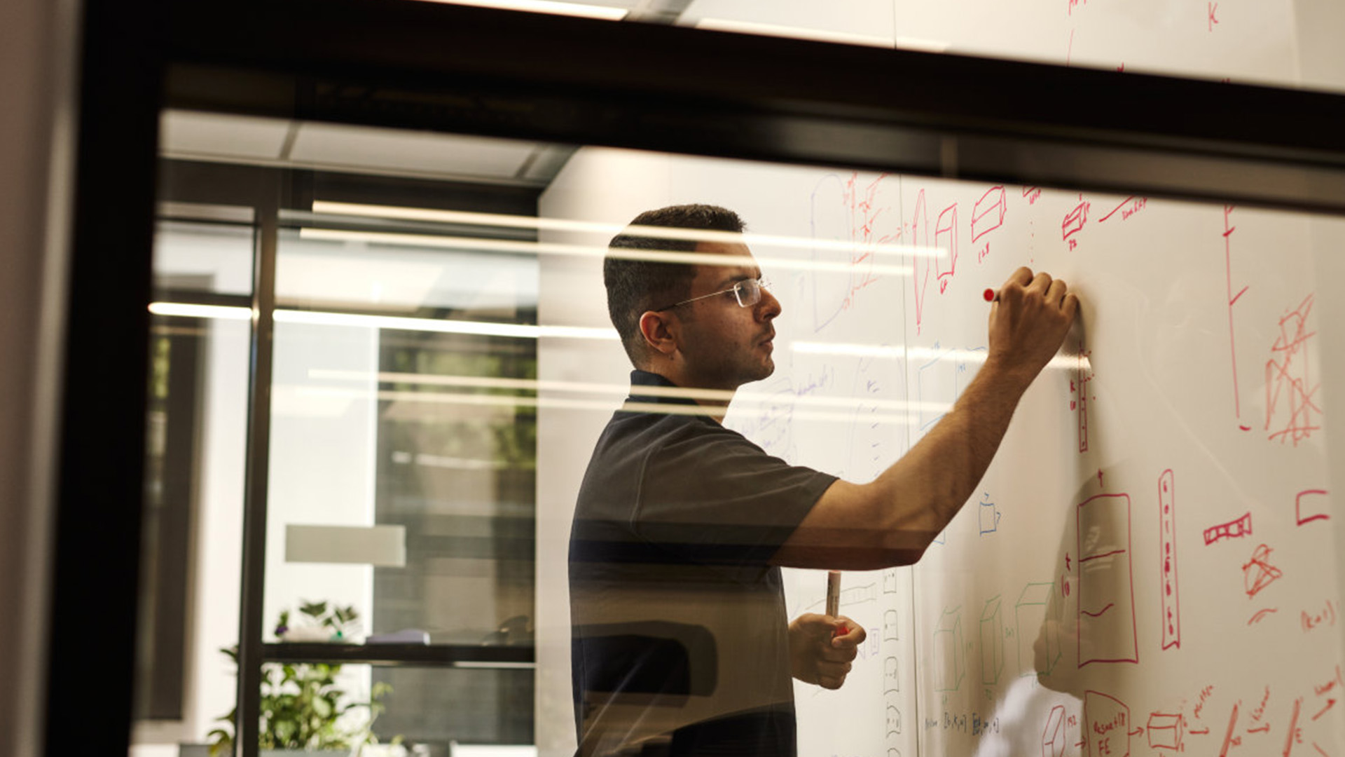 AIML researcher working in a lab