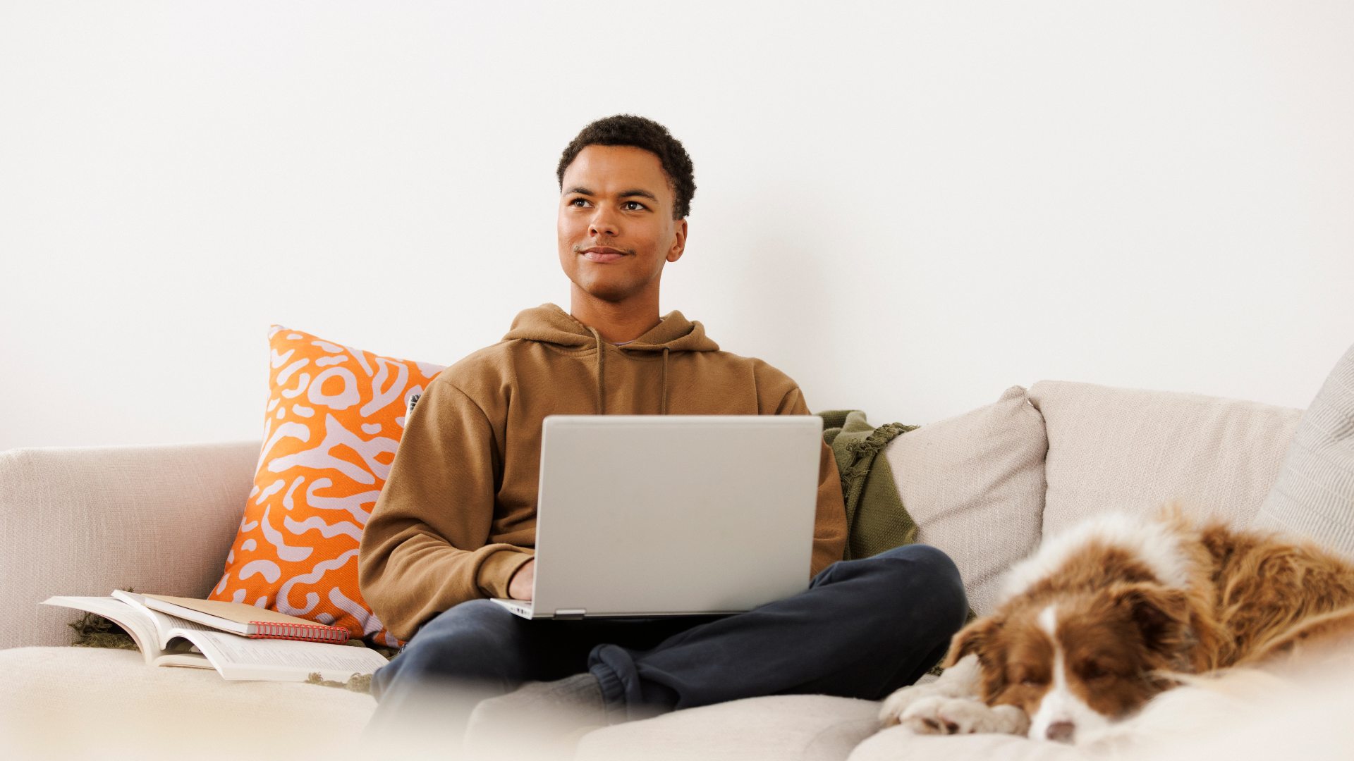 student-on-couch-with-laptop