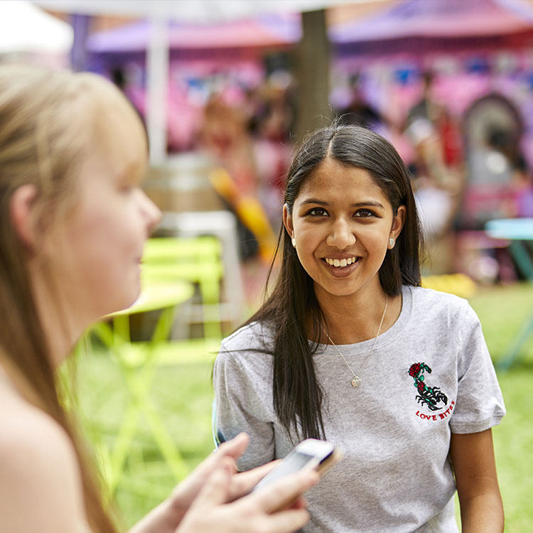 Two students at Orientation week outside 