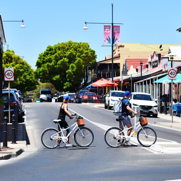 Man cycling along road