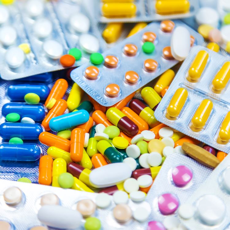Stock image of lots of packets of capsules and tablets