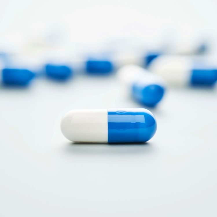 Stock image of a blue and white capsule