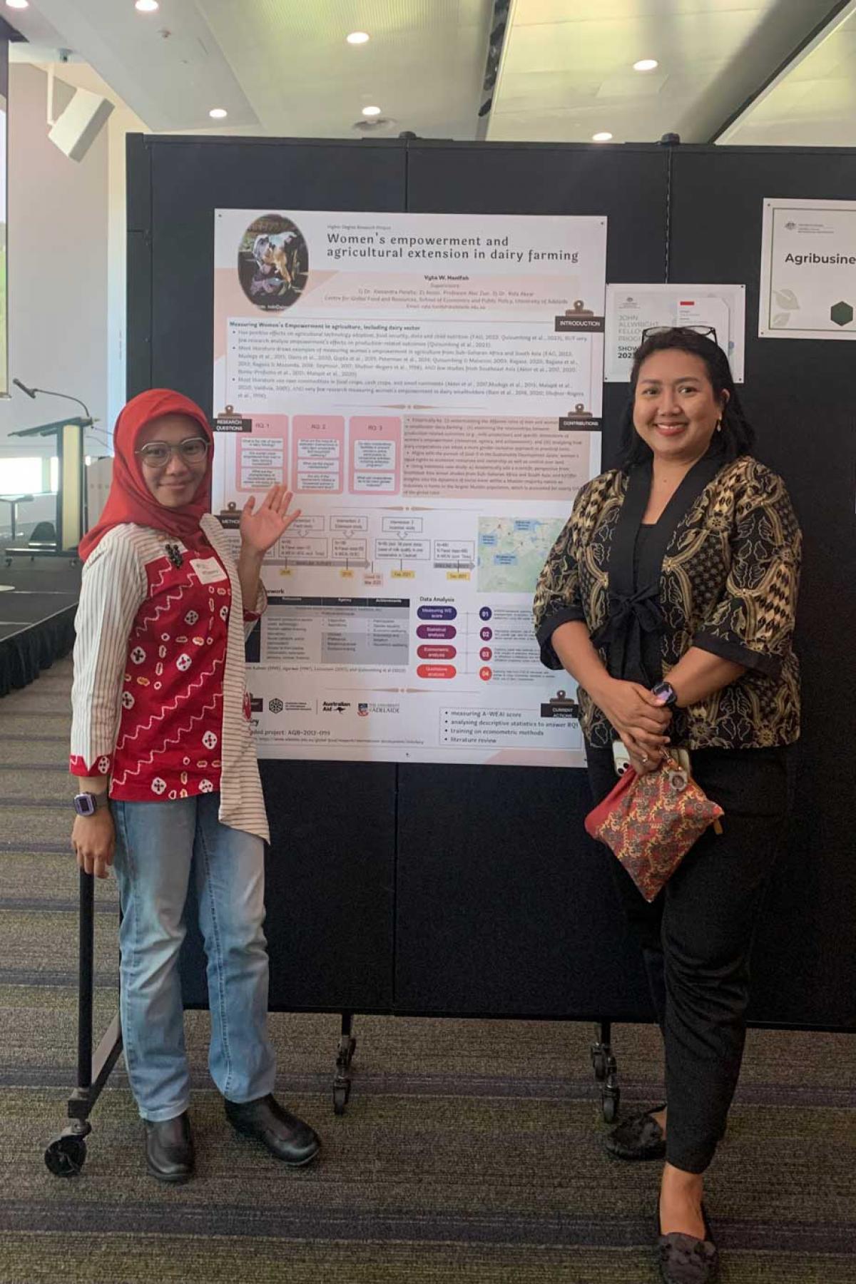 Vyta (left) with her research poster and  Wina (right), the assistant country manager for ACIAR Indonesia