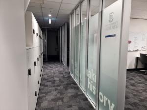 250 North Terrace corridor with lockers and glass office wall