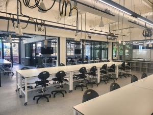 Engineering South teaching lab with exposed ceiling and moveable furniture