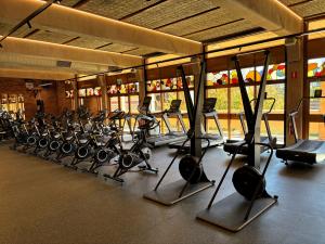 Fitness Hub workout room with equipment overlooking stained glass windows