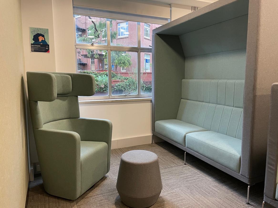 Plush furniture and external window in the Barr Smith Library Access Room